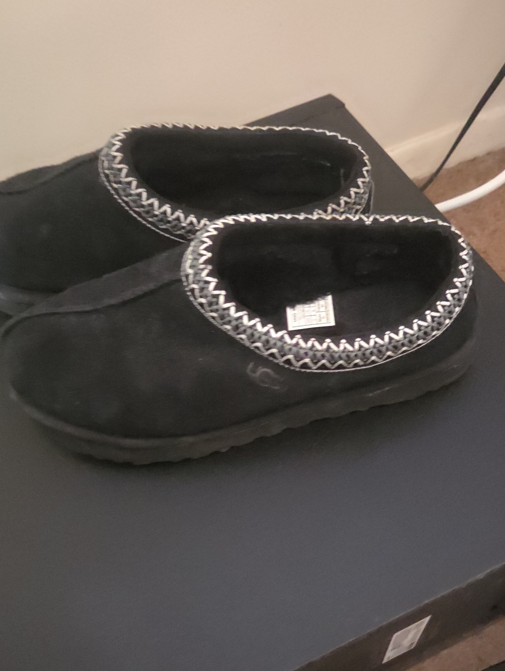 UGG Kids Black Slip-On Moccasin Slippers with Zigzag Trim